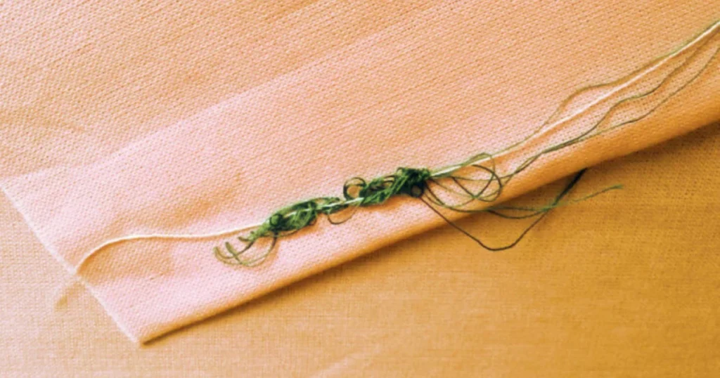 Thread inconsistently knots, loosens, or tangles
